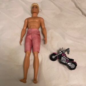 Ken doll and small cute motorcycle